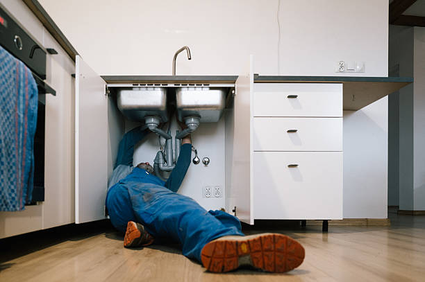 Professional Drain Cleaning technician working in Weatogue, CT